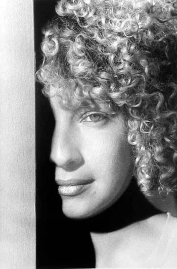blonde curly haired woman