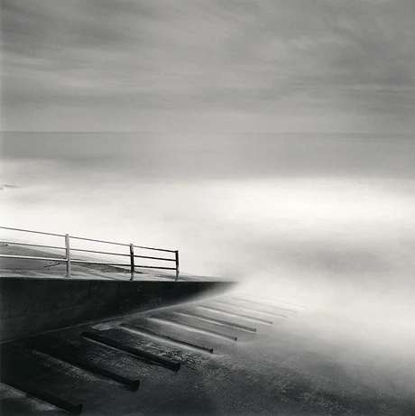 steps going into misty water