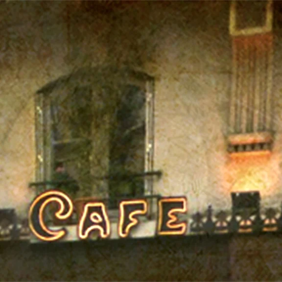 signs reads cafe