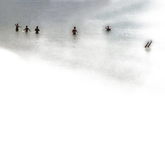 people playing in ocean
