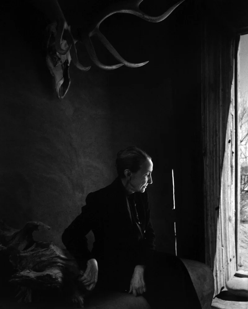 Georgia O'Keeffe looking out window