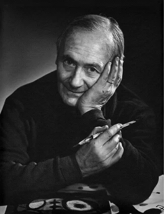 Joan Miró with paint brush