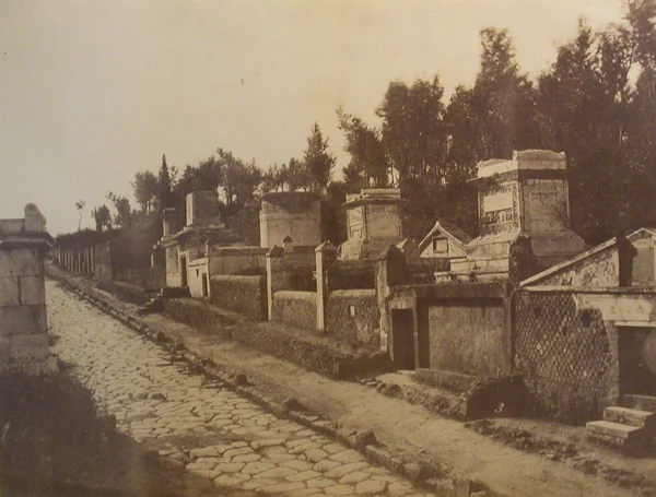street lined with above ground tombs