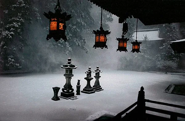 snowy japanese courtyard red lanterns hanging