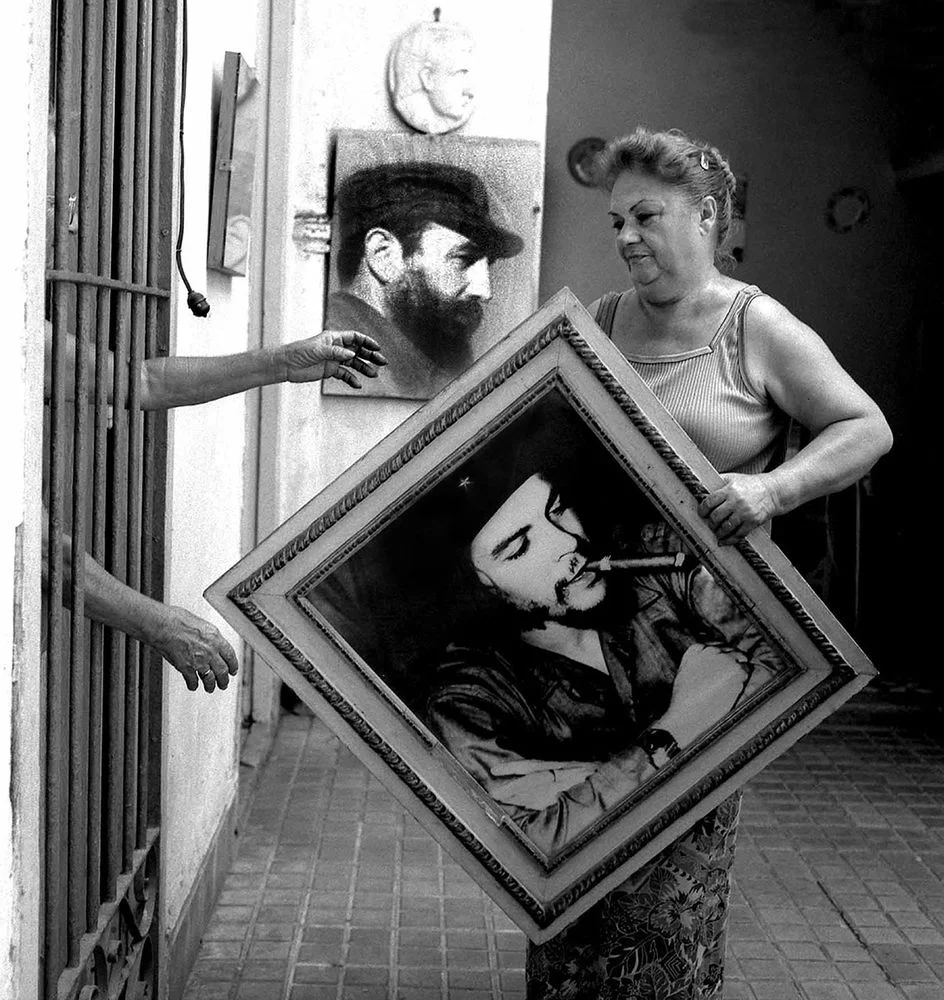 man in jail and woman paintings