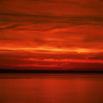 fire red orange seascape black horizon clouds