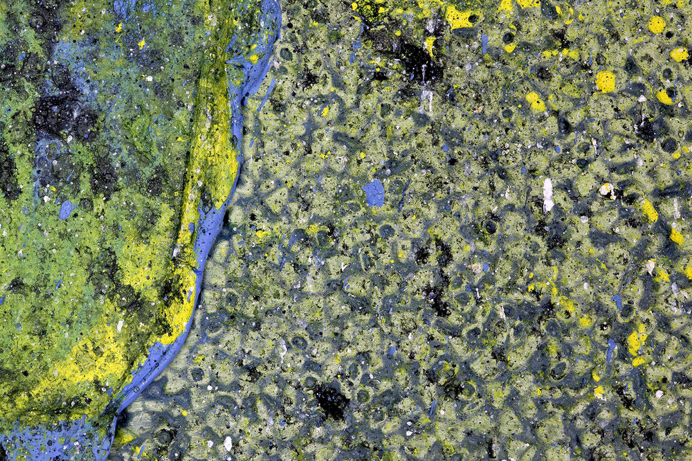 abstract paint splotch close up yellow blue