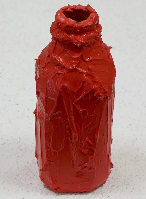 photo thick red painted bottle
