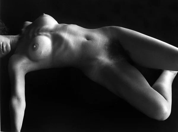 beautiful frontal nude woman reclining