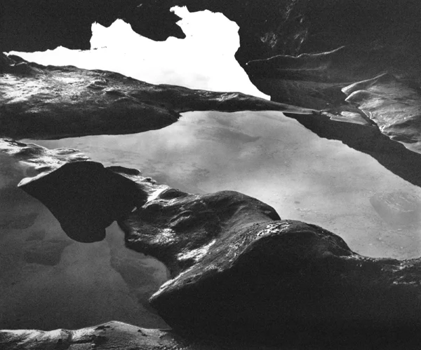 reflective pools in abstract rock formation