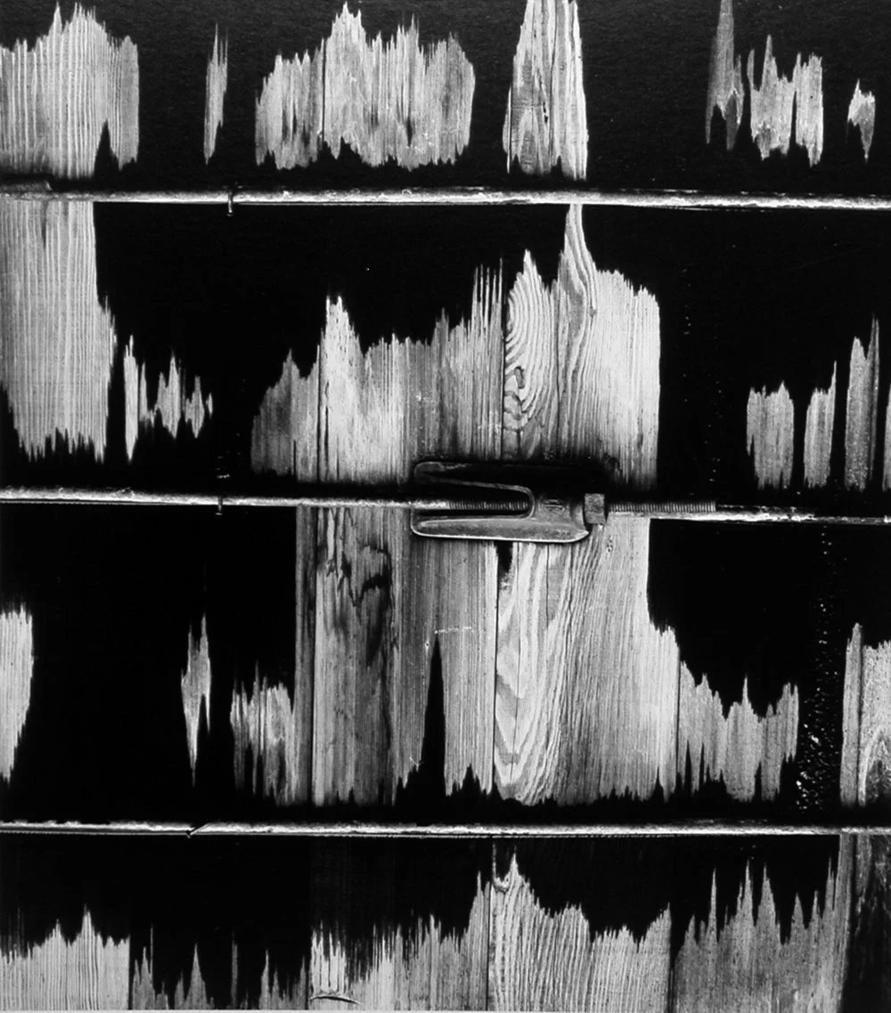 worn black paint wood panel detail exposed