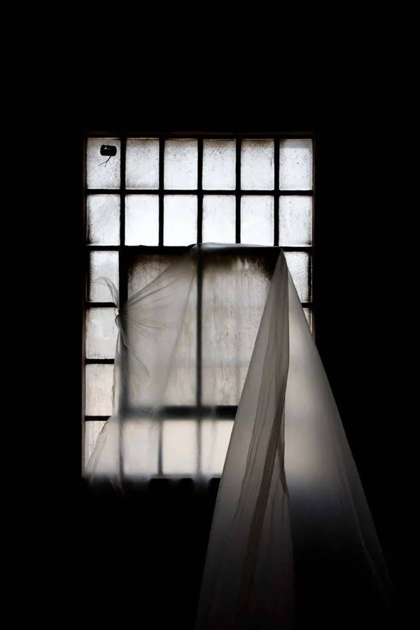 sheet hanging from luminous window