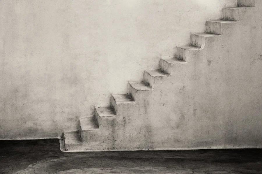 bare simple staircase against wall