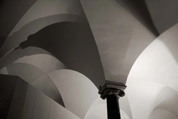 vaulted ceiling with pillar