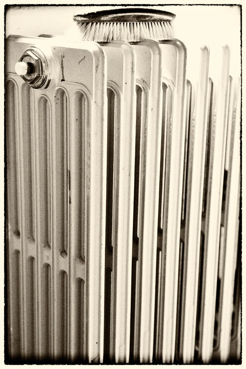 radiator with brush on top