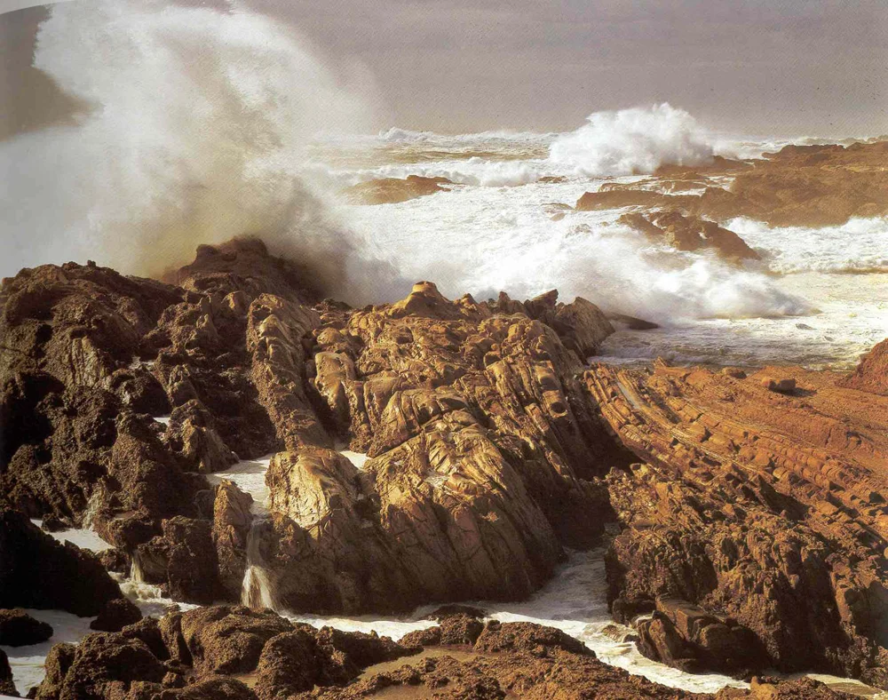 wave crashing on rocks