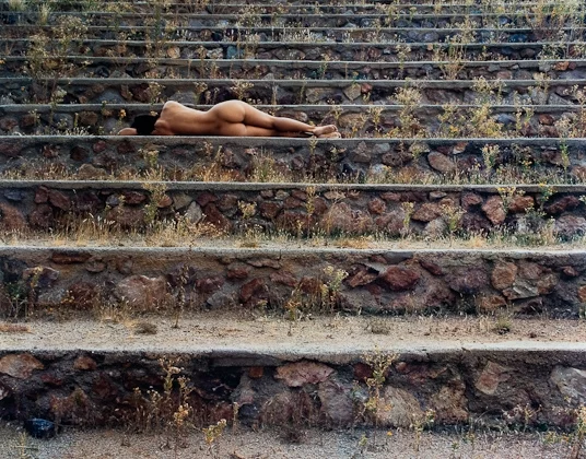 nude on rock steps