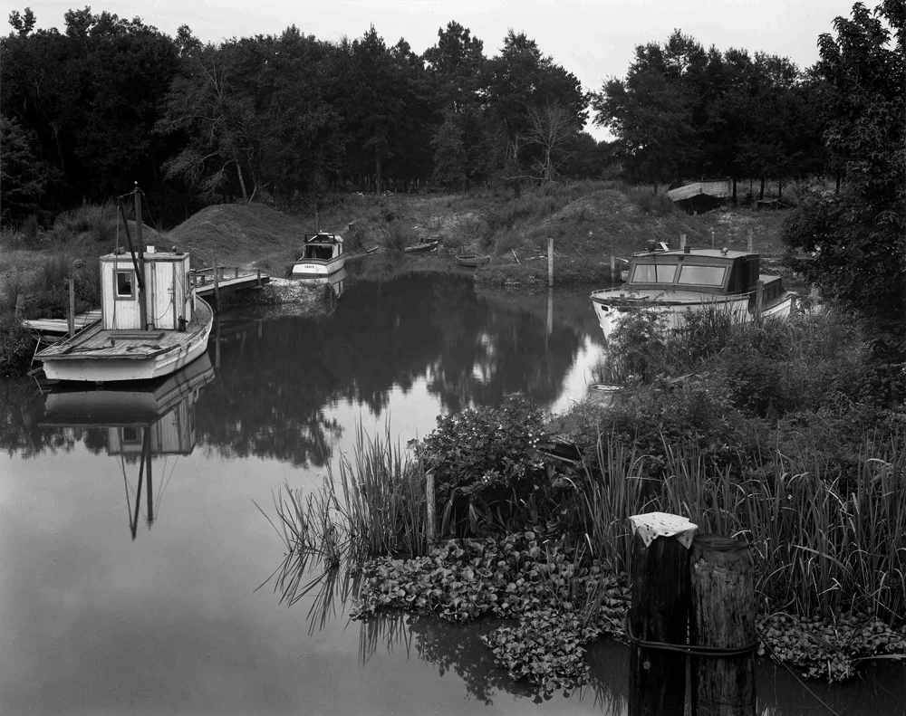 small bay with river boats