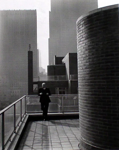 man on rooftop terrace