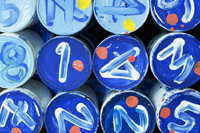 painted numbers on plastic bottle tops