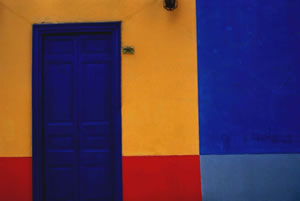 blue door way orange red blue wall