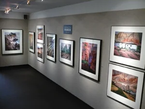 gallery with framed photography on walls