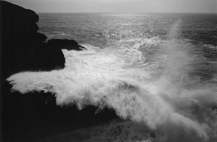 crashing wave sea cliffs