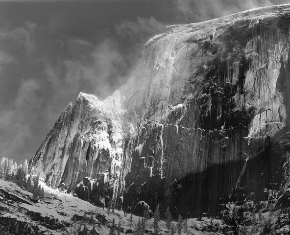 half dome cliff snow trees
