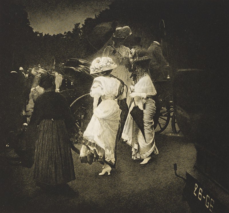 women in long dresses crown races early 1900's