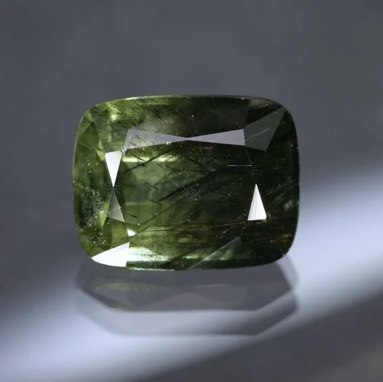 7.43 ct. 'Bi-Color' Peridot with Ludwigite