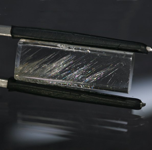 *RESERVED* 20.59 ct. Topaz with Iridescent Needles