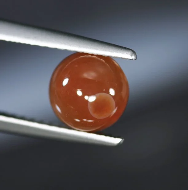 *RESERVED* 0.93 ct. Ukrainian Orange Opal