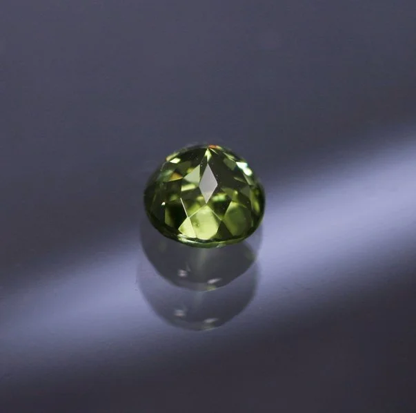 PallasitePeridot0.47ctRdIV.jpg