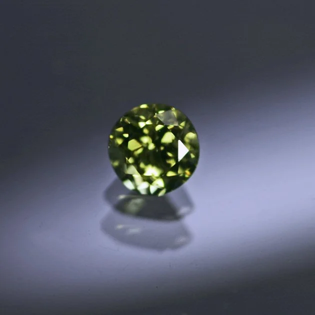 PallasitePeridot0.39ctroundI.jpg