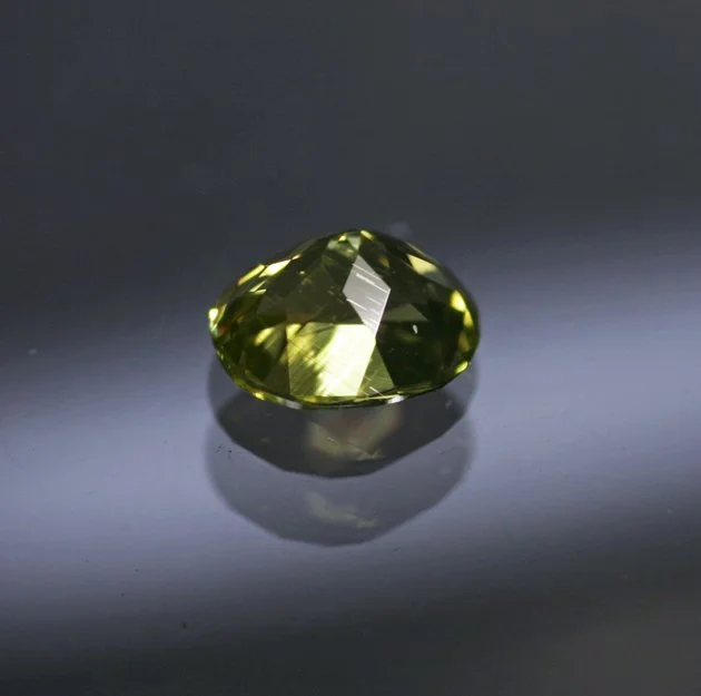 PallasitePeridot0.59ctII.jpg