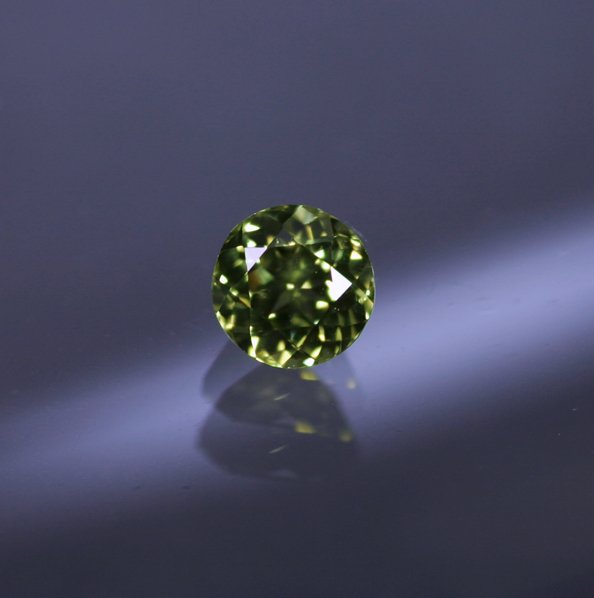 PallasitePeridot0.47ctRdIII.jpg