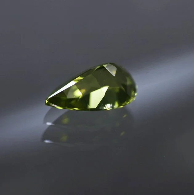 PallasitePeridot0.79ctPearIV.jpg