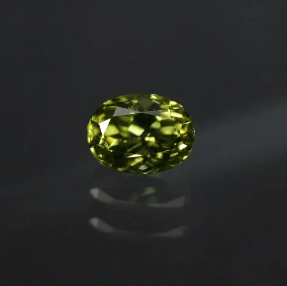 PallasitePeridot0.30ctoval.jpg