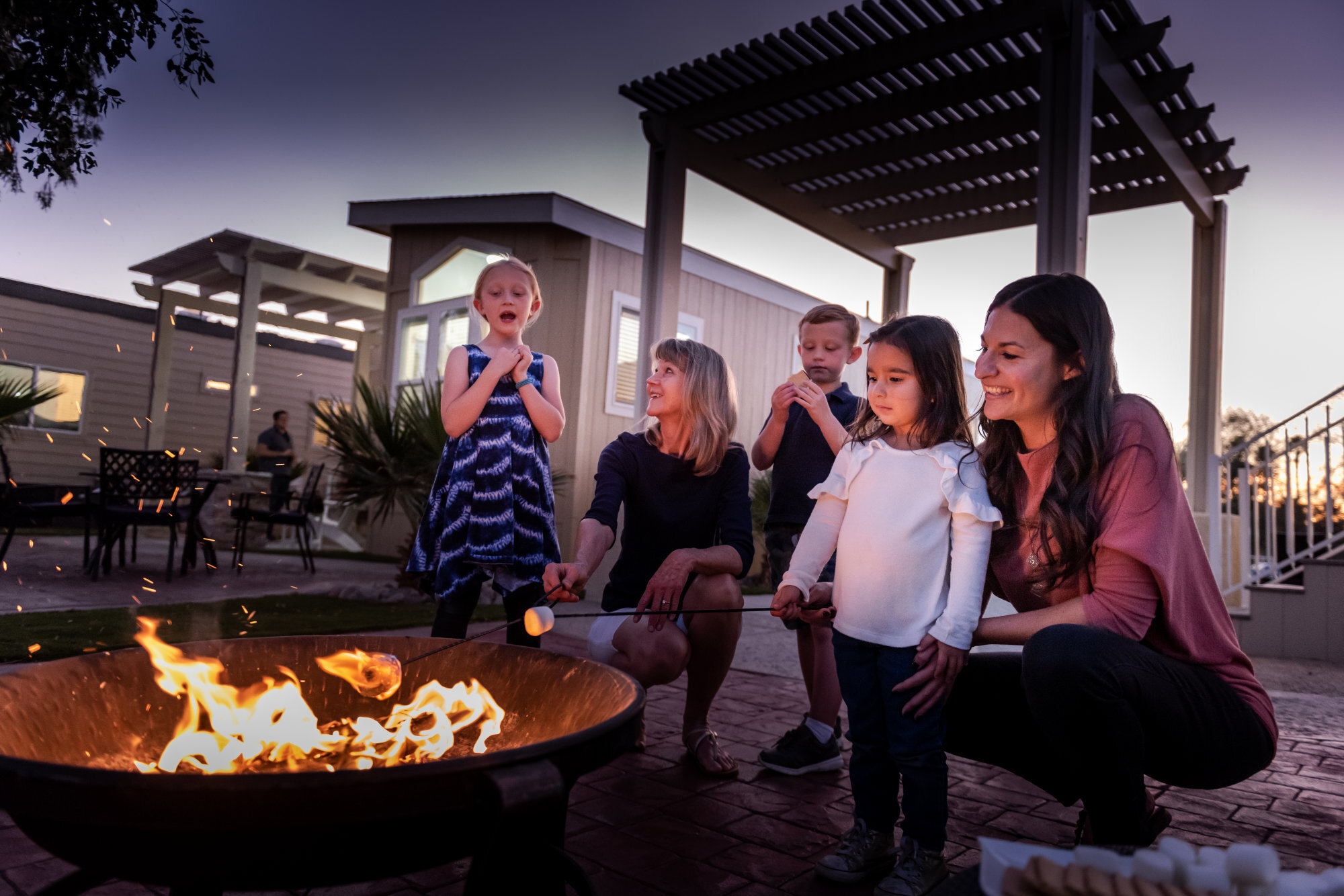 kids-around-fire-pit-marshmellows.jpg