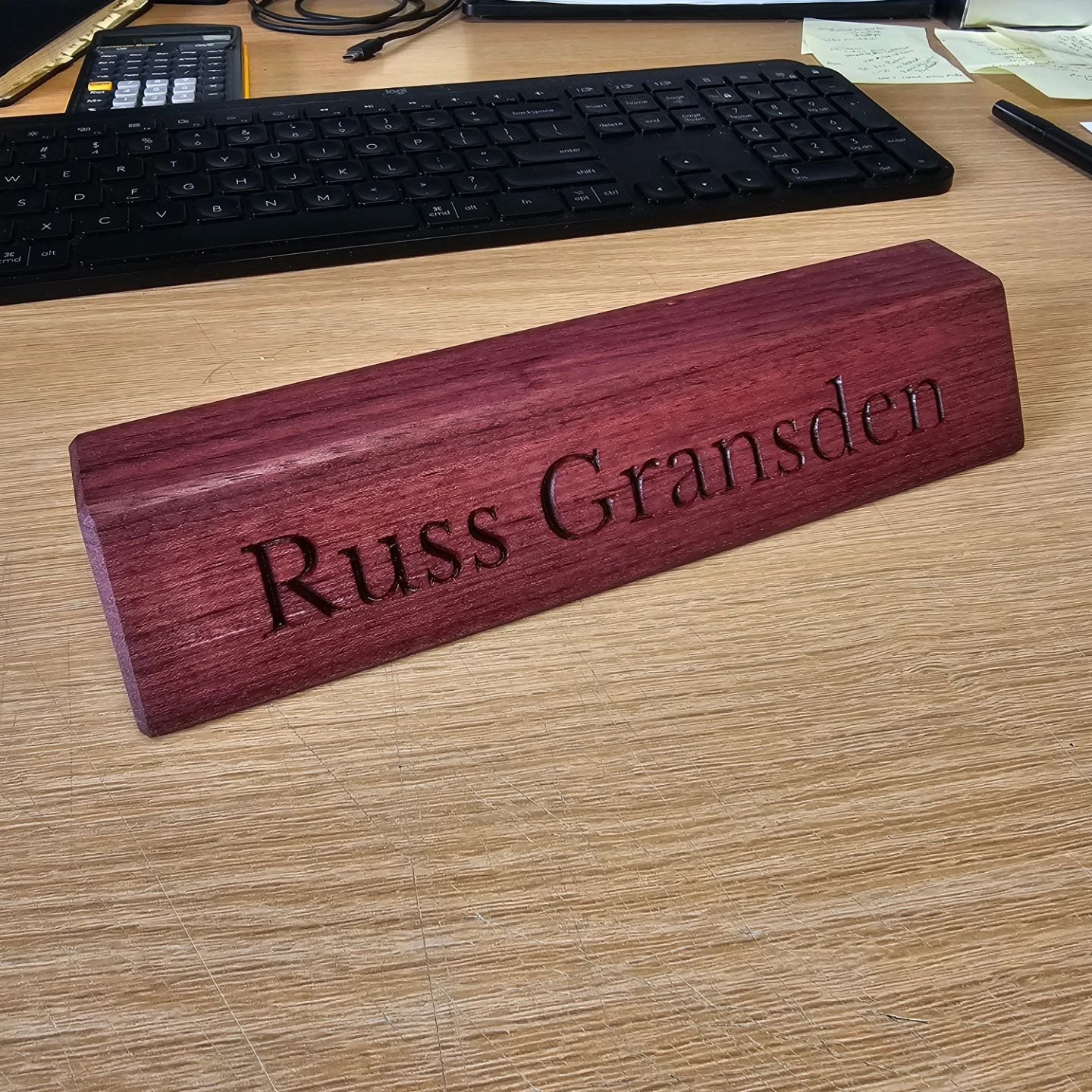 For the last year or two, I've been making walnut nameplates for all our new hires at work. I finally decided to make myself one, but of course, mine needed to be purpleheart. #woodworking