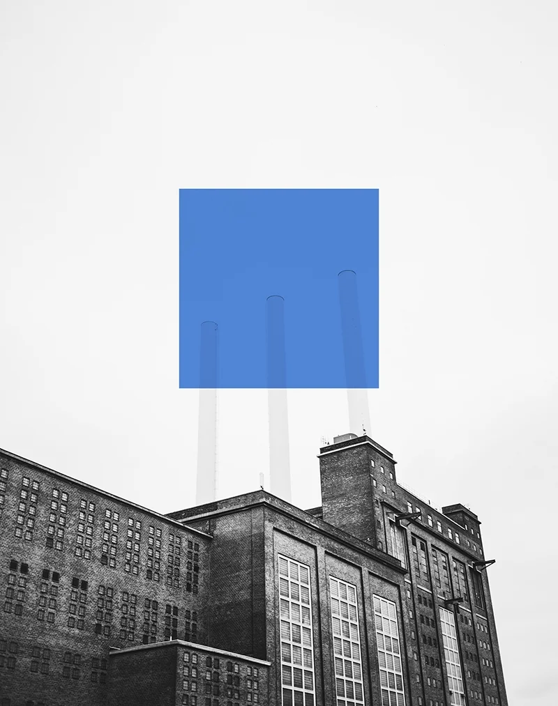 people-analytics-engajamento-fabrica-com-chaminés-em-tom-de-cinza-com-quadrado-azul.jpg