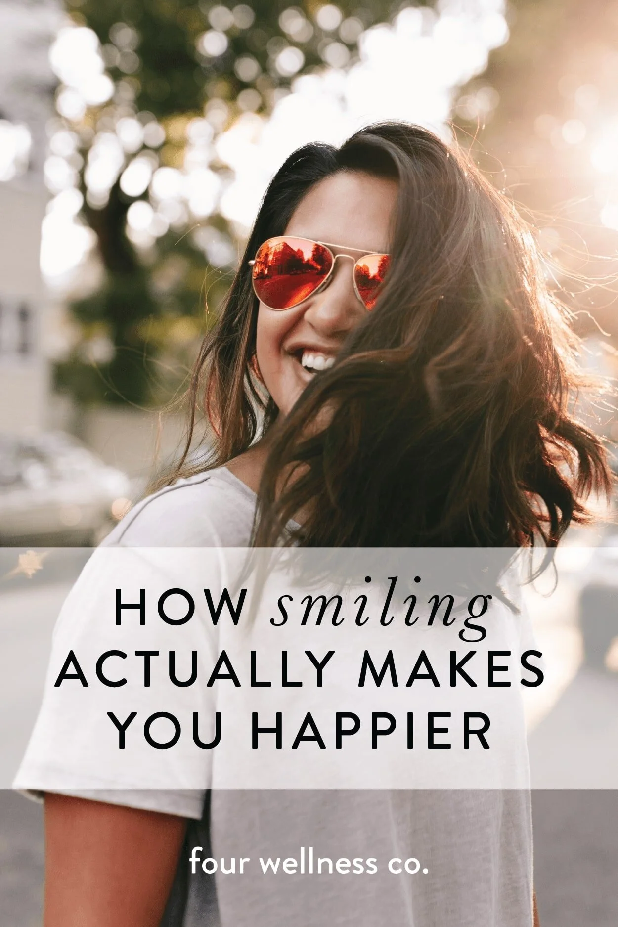 How smiling actually makes you happier &amp; is good for your health // Wellness tips for healthy living // Four Wellness Co. wellness blog, healthy lifestyle tips from an integrative nutrition health coach