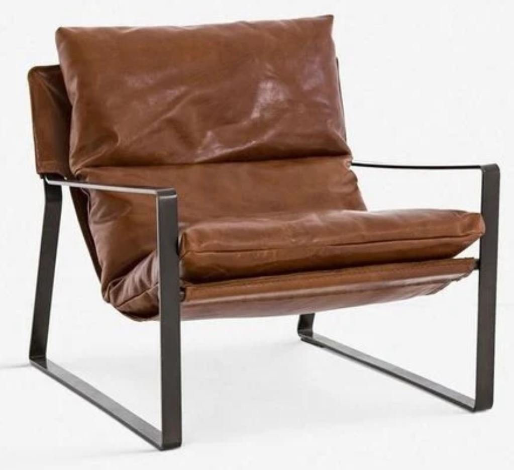 leather chair with metal framed arms.JPG