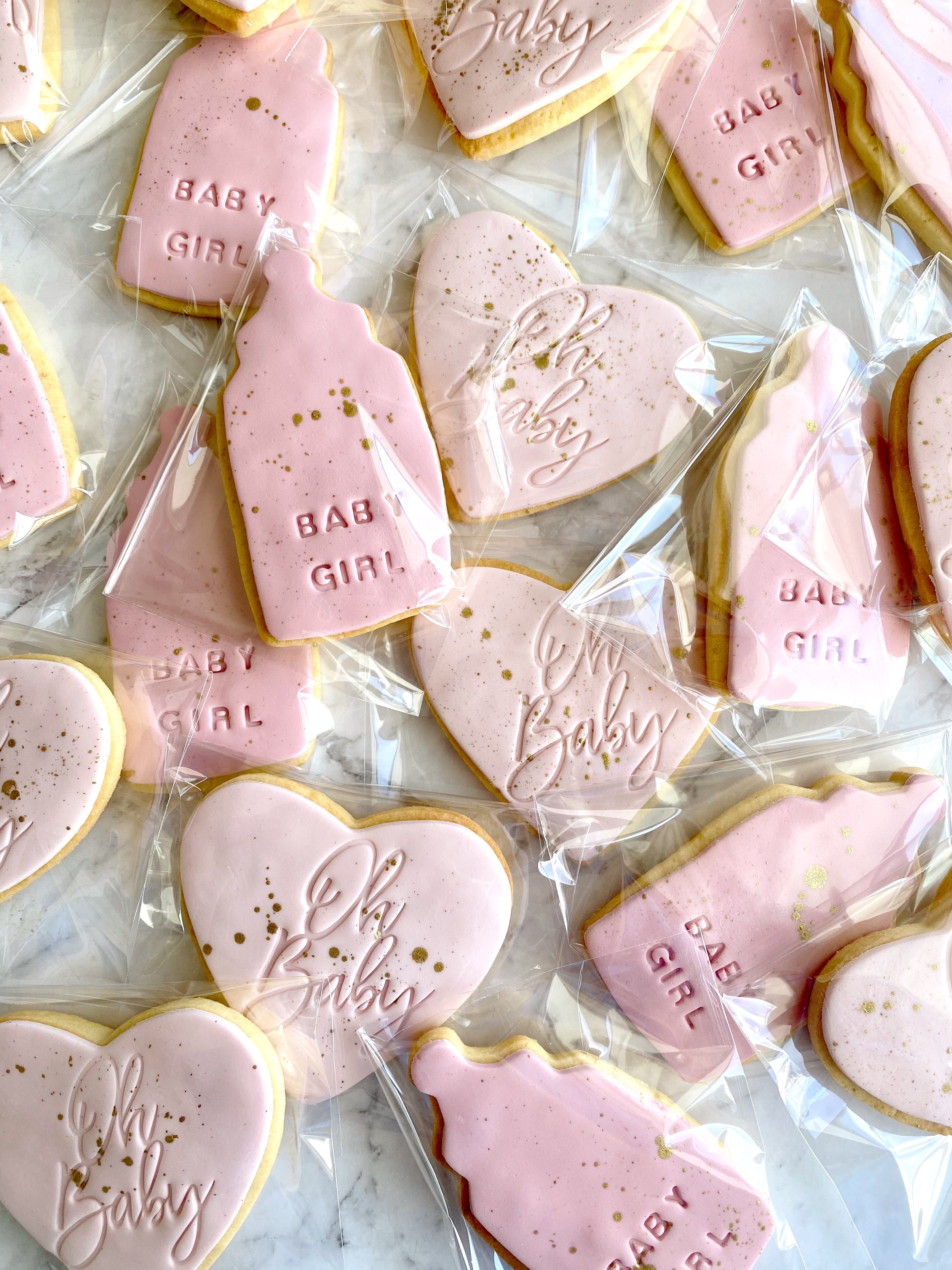 baby shower cookies heart white gold leaf pink baby bottle sprinkles