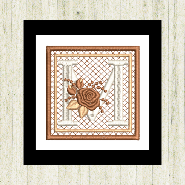 Cream "M", rose-monogram mini quilt machine embroidery design featuring decorative alphabet letters stitched 100% in the hoop for personalized home décor and gift giving.