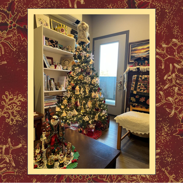 A Christmas tree displaying machine embroidered, tatted snowflakes.