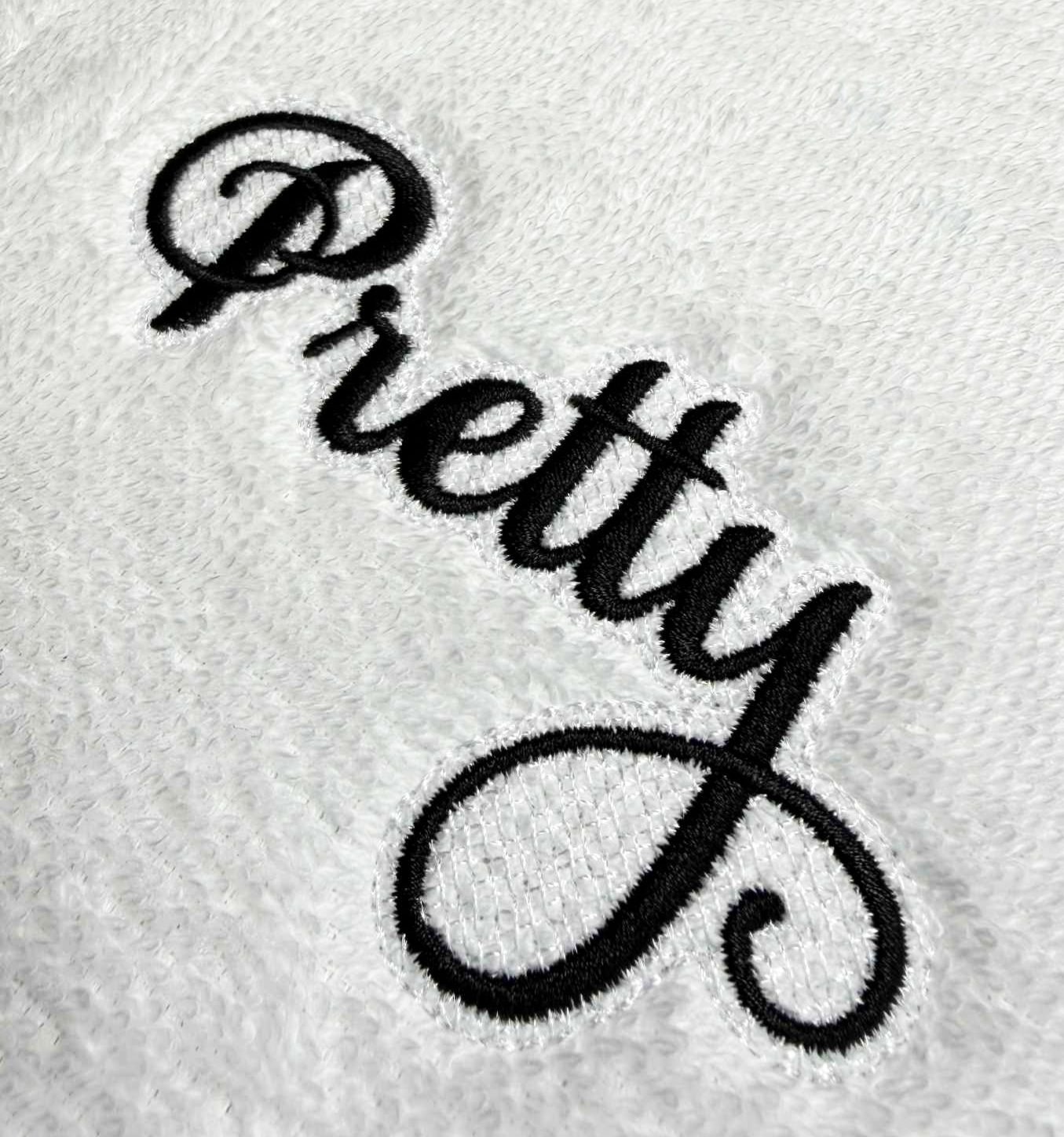 Pretty font with knockdown for custom embroidery digitizing.