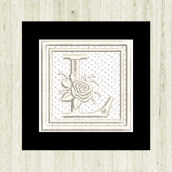 All cream-colored "L", rose-monogram mini quilt machine embroidery design featuring decorative alphabet letters stitched in the hoop for personalized home décor and gift giving. (Copy)