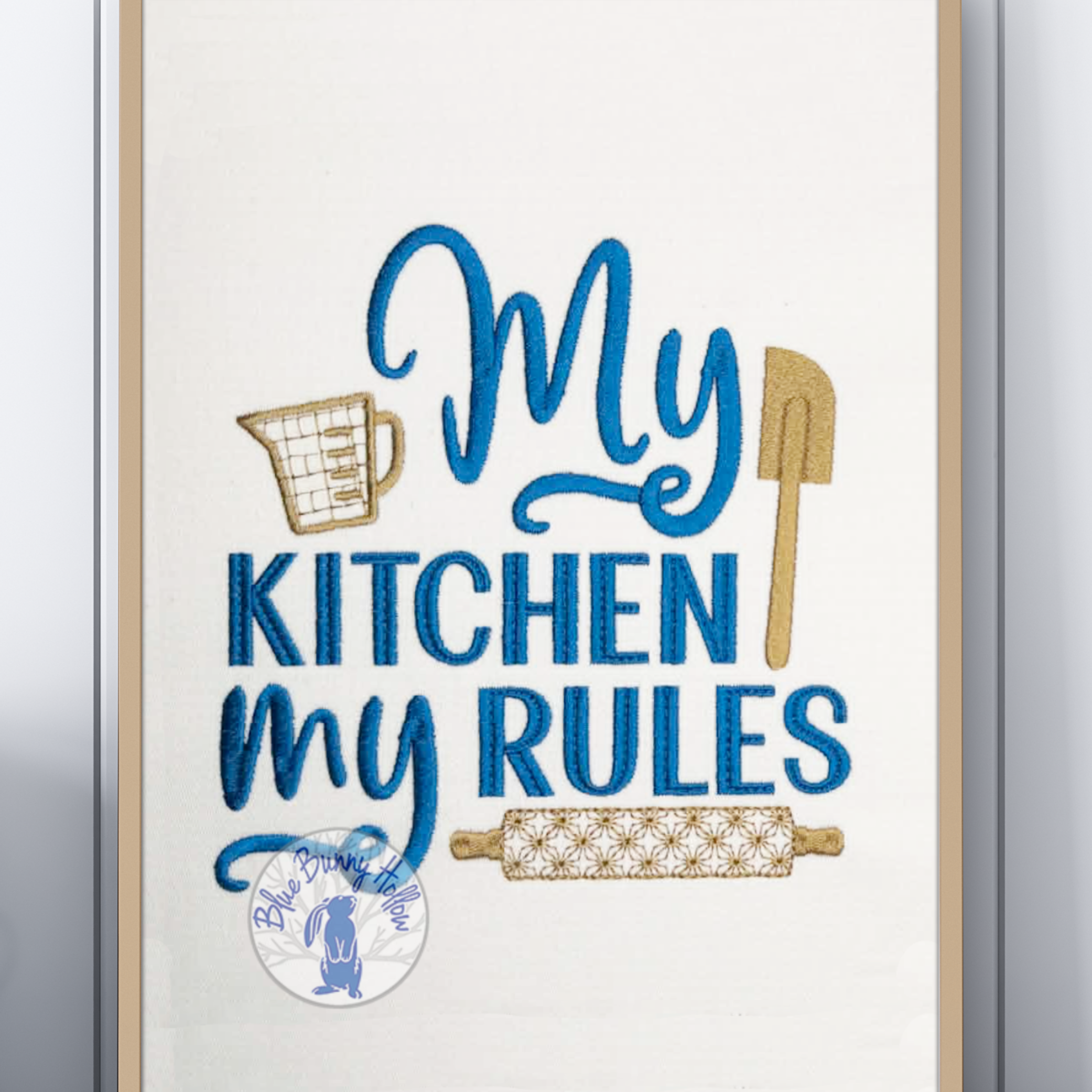 Kitchen machine embroidery design with rolling pin and spatula.