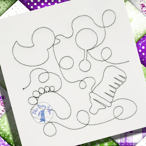 4.	Edge to edge baby quilt embroidery design close up stitching.